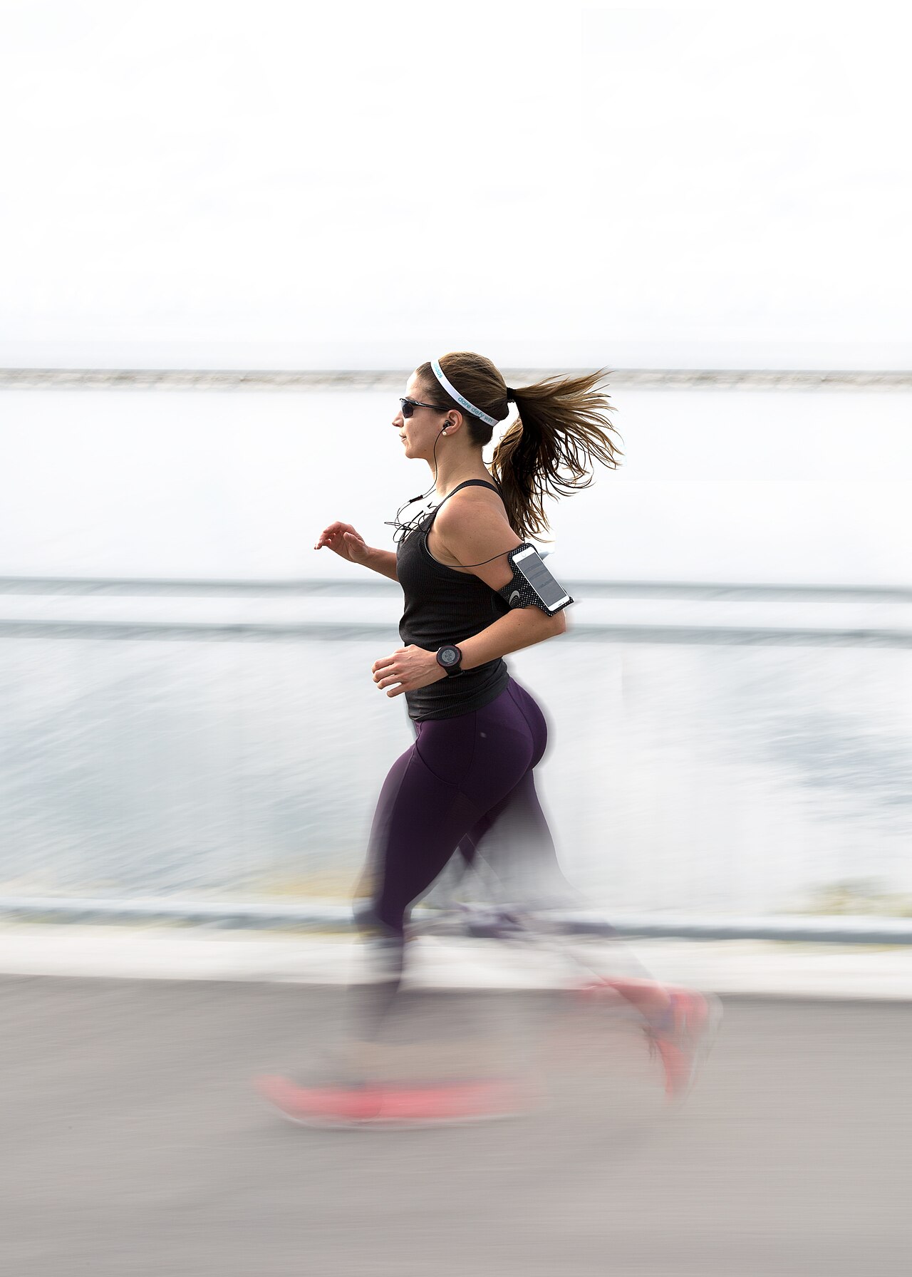 A runner on a waterfront path